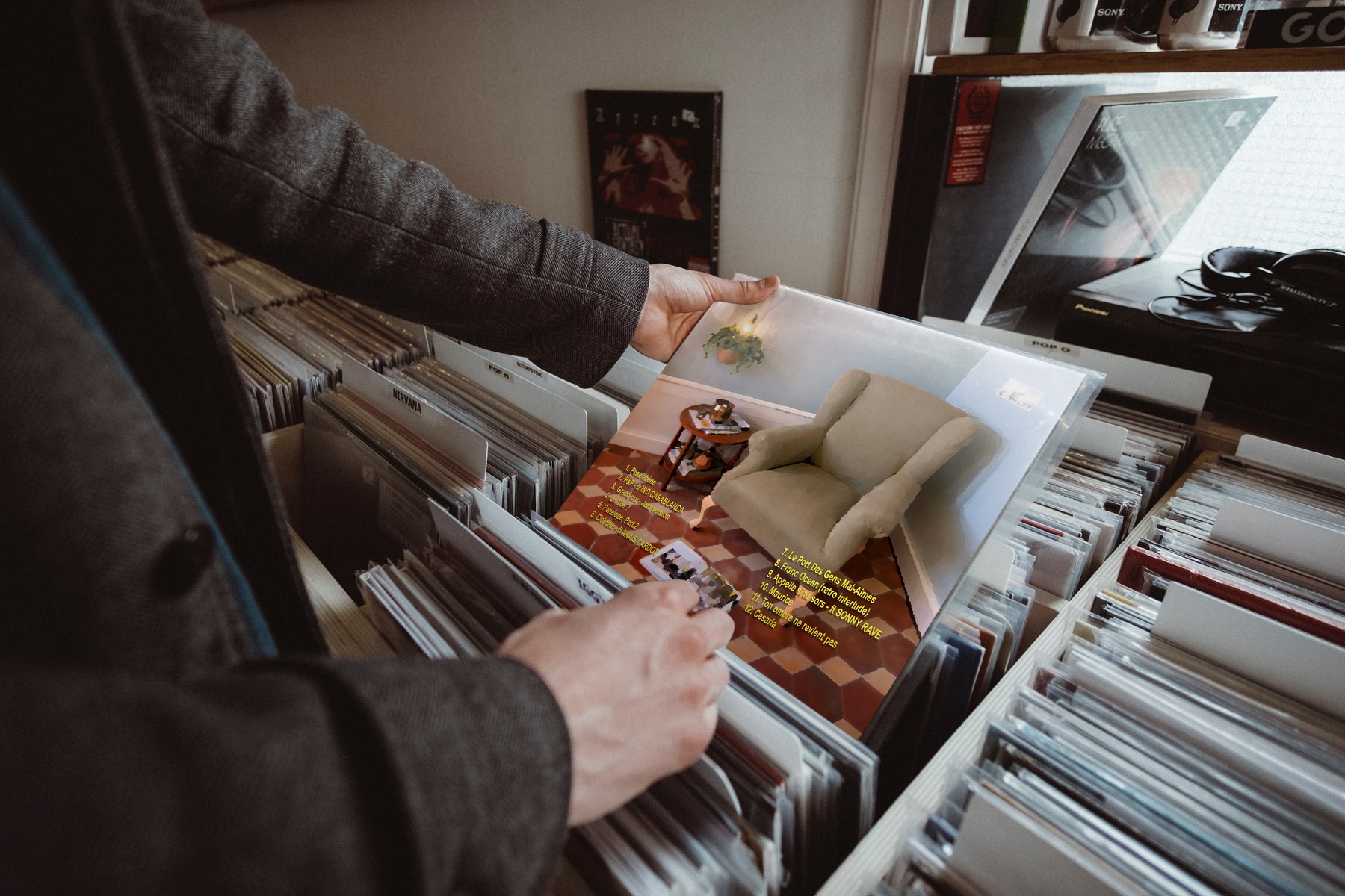 Pochette Spleen. Social Club dans un bac à vinyles